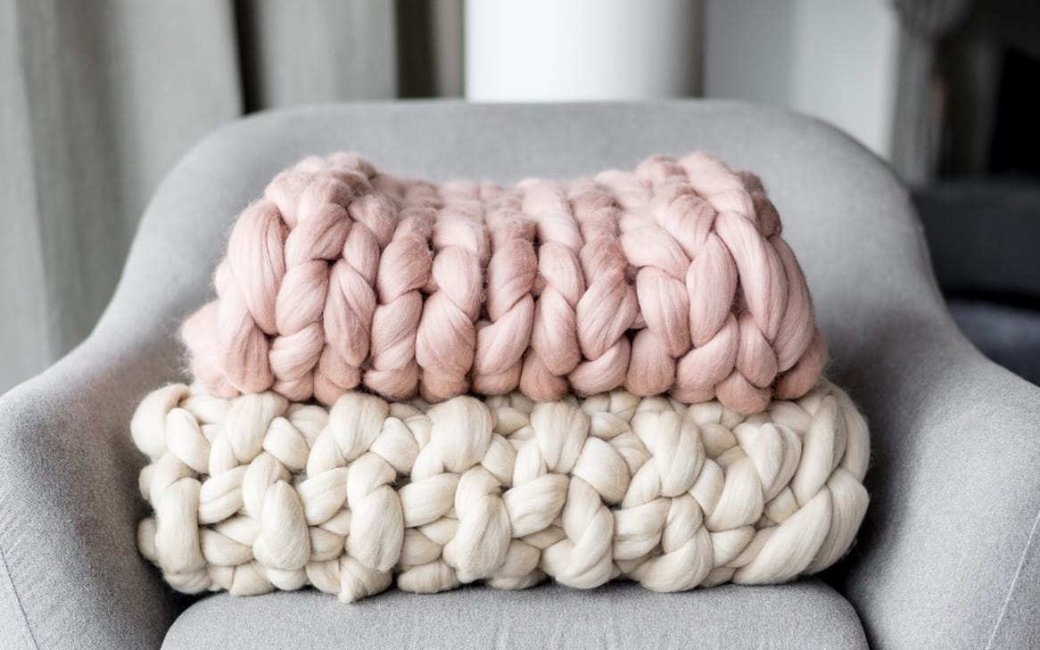 merino wool chunky knit blanket in beige and blush